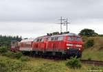 218 385-3 und 218 362-2 rollen am 13.7.10 mit ihren Syltshuttle nach Niebll bei Morsum auf den Hindenburgdamm zu.