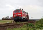 Mit grendem Tf fhrt 218 362-2 mitsamt ihrer Schwester 218 385-3 und dem Syltshuttle nach Westerland (Sylt) am 13.7.10 durch die Morsumer Fotokurve am Fuzzi vorbei.