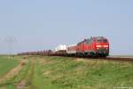 Mit einem weiteren Syltshuttle nach Niebll fahren 218 397-8 und 218 380-4 am 23.4.11 bei Klanxbll am Fuzzi vorbei.