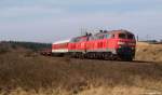 218 340-8 und 218 379-6 dieseln am 2.4.11 gemeinsam mit dem Syltshuttle nach Niebll durch die Morsumer Fotokurve.