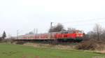 218 451-3 dieselt am 13.4.13 mit dem RE nach Bad Harzburg bei Rssing dem nchsten Halt in Hildesheim Hbf. entgegen.