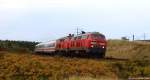 218 345-7 & eine Schwestermaschine dieseln am 10.10.09 mit einem IC bei Morsum durch die Landschaft.