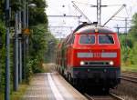 Die Braunschweiger 1218 451-3 mit ihrer RB nach Husum bei der Einfahrt in Schleswig. 21.06.2014