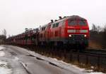 218 359-8 und ihre Schwester zogen am 27.02.10 das Syltshuttle kurz hinter Klanxbll durch die Landschaft.