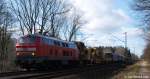 218 385-3 fuhr am 21.03.10 mit einem Bauzug durch das rtchen Prisdorf an der KBS 131.