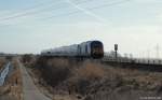 DE2000-03  R.SH  fhrt am 13.3.10 mit der NOB nach Westerland (Sylt) bei Klanxbll dem Hindenburgdamm entgegen.