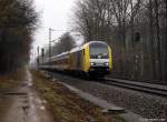 ER 20-012 fhrt am 6.2.11 mit der NOB nach Westerland (Sylt) durch den Prisdorfer Wald.