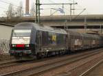 223 013-4 von PCT dieselt hier mit dem blichen Autotransportzug(32 Hccrrs Waggons) durch HH-Harburg in den Abstellbereich.