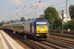DE2000-01 der NOB fhrt am Abend des 11.6.11 mit der NOB 81726 nach Westerland (Sylt) durch Eidelstedt und strebt weiter gen Norden.