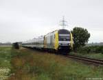 ER 20-011 fhrt am 3.7.11 mit der NOB 81746 nach Westerland (Sylt) kurz hinter Niebll der Insel entgegen.