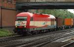 223 031-6/EVB 420 12 dieselt hier mit einem Containerzug durch Hamburg. 19.8.2011