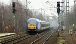 DE 2000-01 oder 223 053-0 mit der NOB nach Westerland hat hier Einfahrt in Elmshorn. 31.12.11