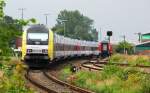 ER 20-001/223 001-9 hat hier mit der NOB nach HH-Altona Einfahrt in den Niebller Bahnhof. 04.08.12
