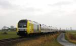 Mit der NOB 81714 nach Westerland (Sylt) hat ER 20-015/223 015-9 am 22.2.14 den Kbf. Lehnshallig durchfahren und strebt nun weiter zum nächsten Halt nach Klanxbüll.