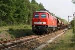 232 093-5 durchfuhr am 29.05.12 mit einem Schotterzug aus Cunnersdorf nach Senftenberg den Bahnhof Wiednitz.