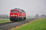 In der Planklage des Kalizuges 60758(Baalberge-Wismar) rollt die 232 571 als Lz wieder nach Wismar.Hier am 27.11.2013 in Gross Schwa.