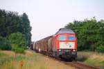 DB 1 232 908-4 mit dem EZ/GD 44716 aus Maschen auf dem Weg nach Dänemark hier festgehalten am Bü Sollbrück III der Strecke (Kiel)Jübek-Husum(KBS 134). 22.07.2014