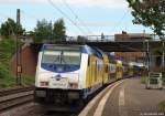246 002-0 steht am 5.5.12 mit dem ME nach Hamburg Hbf. im Bhf. Hamburg-Harburg.