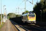 Locon 401/264 005-0 fhrt hier mit dem DGS 25489(Jbek-Bchen/Strafurt)und dem leeren Eaos Ganzzug durch Schleswig. 13.09.12


