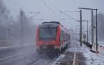 Nachschuss auf die Lint-Doppeltraktion, bestehend aus 648 334/834 und 648 353/853 von DB Regio Kiel, welche am 16.12.10 bei Schneefall durch den Bhf. Ashausen strebten.