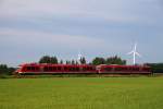 DB Regio 0648 350/850 und 345/845 nach Kiel passieren den Bü Sollbrück I bei Jübek. 26.06.14
