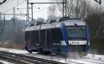 VT 305 oder 648 365/865 der Nord-Ostsee Bahn auf dem Weg von Schleswig nach Kiel hier bei der Ausfahrt aus dem Schleswiger Bahnhof. 15.01.10