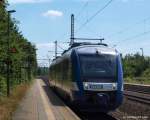 Von Kiel Hbf. kommend fhrt NOB-Lint  VT 303  oder 648 363-9/863-8 fhrt am 19.7.10 als NOB nach Husum in den Schleswiger Bhf. ein.