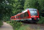 648 332-4/832-3 und 648 346/846 fahren am 24.7.10 als RE nach Lbeck Hbf. kurz vor Pln durch die Landschaft.