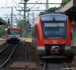 648 004/504 und ein AKN-VTA treffen sich am 17.7.10 im Bhf. Neumnster.