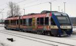 Einer der wenigen bunten VT's, der NOB VT 303 hier bei der Abfahrt aus Schleswig am 14.2.2010