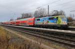 111 066-7 die  Biergartenlok  schiebt einen Regionalzug in den Bahnhof von  Prien am Chiemsee ein.