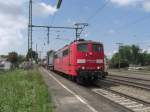 151 021-3 durchfhrt soeben den Bahnhof von bersee am Chiemsee.