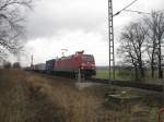 152 112-9 mit einem Containerzug zwischen Prien am Chiemsee und Bernau.