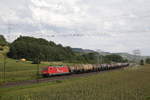 185 605-3 von  Rhein-Cargo  mit einem Kesselwagenzug aus Wrzburg kommend am 18.