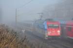 Durch den Nebel saust die 101 118 mit dem IC 2213 nach Stuttgart.Hier in Sildemow am 19.11.2012.