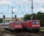 101 047-9 mit EC nach Brno und 114 039-1 mit RE 3 am 19.07.10 in Stralsund