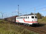Am 18.10.2007 verlsst 110 511 mit ihrem Zug nach Lbbenau den Rbf Rostock-Seehafen.