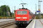 111 179-8 schob am 11.8.13 den RE nach München aus dem Rosenheimer Bf. heraus.