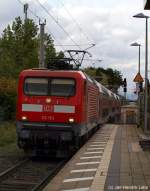 112 153-2 fhrt am 16.10.10 von Hamburg kommend mit der RB nach Ahrensburg in den Bhf. Rahlstedt ein.