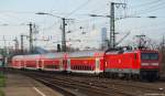 Am 20.11.10 schiebt 112 166 den RE7 nach Krefeld Hbf. aus dem Bhf. Kln Messe/Deutz hinaus.