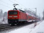 Am Zugende des RE 21012 nach Kiel Hbf. schiebt 112 154-0 mit. Prisdorf, den 20.12.10
