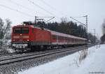 112 153-2 fhrt am 29.12.10 mit der RB nach Hamburg-Altona aus dem Bhf. Prisdorf ab.