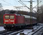 Eher selten in Schleswig an zu treffen ist die 112 143-3 die hier mit dem SHE nach Hamburg in Schleswig einfhrt. 7.1.11