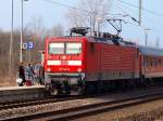 112 140-9 mit dem SH-Express mit Ziel Hamburg Hbf in Schleswig. 03.03.2011