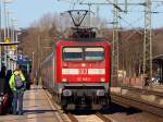 Aufsteigende Hitze hatte 112 148-2 als mit dem SH Express nach Hamburg als sie in Schleswig einfuhr. 06.3.11