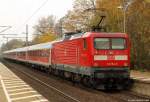 112 154-0 steht am 5.11.11 mit dem RE nach Flensburg im Bhf. Elmshorn.