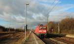 112 173-0 mit dem 7 Waggon-SHE nach Hamburg steht hier abfahrbereit in Schleswig. 17.12.11