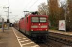112 173-0 fhrt am 5.11.11 mit dem RE nach Hamburg Hbf. aus dem Bhf. Elmshorn ab.