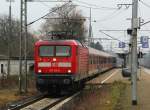 112 140-9 verlsst hier Elmshorn Bhf mit einer RB nach Hamburg am Haken. 31.12.11