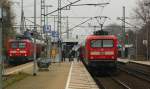 112 143-3(li)mit dem RE von Kiel nach Hamburg Hbf und 112 176 mit einer RB nach Itzehoe, hier beim Treffen in Elmshorn. 31.12.11